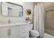 Stylish bathroom with modern vanity, new fixtures, and a tiled shower at 12753 Buckhorn Creek St, Parker, CO 80134