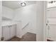 Upstairs hall featuring storage and access to a stylish, updated bathroom at 12753 Buckhorn Creek St, Parker, CO 80134
