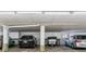 Spacious parking garage with multiple parking spaces and storage cabinets for added convenience at 13631 E Marina Dr # 608, Aurora, CO 80014