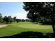 Picturesque golf course with perfectly manicured green, sand traps, and beautiful landscaping at 13631 E Marina Dr # 608, Aurora, CO 80014