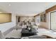 Bright, airy living room featuring sophisticated furniture and an open floor plan at 13631 E Marina Dr # 608, Aurora, CO 80014