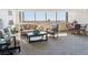 Bright living room featuring large windows offering great views and comfortable seating at 13631 E Marina Dr # 608, Aurora, CO 80014