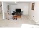 Finished basement with comfortable seating, a large TV, and soft carpeting at 5223 Gray Wolf Ln, Castle Rock, CO 80104