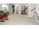 Basement area featuring a hallway with a view into an adjacent bathroom at 5223 Gray Wolf Ln, Castle Rock, CO 80104