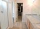 Bathroom showcasing a glass-enclosed shower and a vanity with granite countertops and dual sinks for convenience at 5223 Gray Wolf Ln, Castle Rock, CO 80104