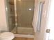 Modern bathroom featuring a glass-enclosed shower with a towel rack at 5223 Gray Wolf Ln, Castle Rock, CO 80104