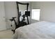 Bedroom featuring a Peloton exercise bike and a mirror, perfect for fitness enthusiasts at 5223 Gray Wolf Ln, Castle Rock, CO 80104