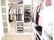 Organized closet with shelves and hanging rods, providing ample storage space for clothing and accessories at 5223 Gray Wolf Ln, Castle Rock, CO 80104