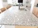 Granite kitchen island with stainless steel sink, modern fixtures, and seating at 5223 Gray Wolf Ln, Castle Rock, CO 80104