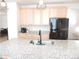Bright kitchen featuring granite countertops, stainless steel appliances, and eat in dining at 5223 Gray Wolf Ln, Castle Rock, CO 80104