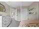 Cozy bedroom features soft carpet, storage, and a delightful reading corner with book shelves at 11188 Latigo Ln, Parker, CO 80138