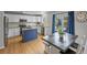 Charming kitchen with modern appliances, granite countertops, eat-in dining space and backyard access at 11188 Latigo Ln, Parker, CO 80138