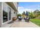 Outdoor patio with attractive seating arrangement for entertaining in a well-maintained backyard at 11188 Latigo Ln, Parker, CO 80138