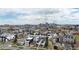 Aerial view of urban neighborhood with modern homes and city skyline at 1578 Lowell Blvd # 1, Denver, CO 80204