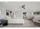 Bright main bedroom boasts light grey carpet, recessed lighting, and a large picture window at 1578 Lowell Blvd # 1, Denver, CO 80204