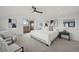 Spacious bedroom includes a walkout deck, neutral colored walls, and recessed lighting at 1578 Lowell Blvd # 1, Denver, CO 80204