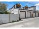 Modern townhomes featuring balconies, garages, and contemporary design elements at 1578 Lowell Blvd # 1, Denver, CO 80204