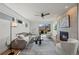 Stylish living room with a cozy fireplace, modern decor, and inviting ambiance at 1578 Lowell Blvd # 1, Denver, CO 80204