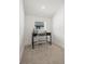 Bright office space with desk, chair, and window allowing natural light in at 1578 Lowell Blvd # 1, Denver, CO 80204
