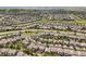Aerial view of neighborhood, featuring houses, streets, and landscaping at 2090 Bellavista St, Castle Rock, CO 80109