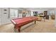 Basement featuring a pool table, ample seating, and natural light at 2090 Bellavista St, Castle Rock, CO 80109