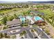 Aerial view of community pool with slides, ponds, and recreation area with ample parking available at 2090 Bellavista St, Castle Rock, CO 80109