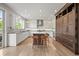 Modern kitchen with white cabinets, an island, stainless steel appliances, and ample counter space at 2090 Bellavista St, Castle Rock, CO 80109