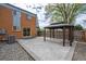 Backyard featuring a gazebo, paved patio, and fenced yard at 11651 Pennsylvania St, Northglenn, CO 80233