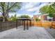 Backyard featuring a gazebo and a paved patio with wood fencing at 11651 Pennsylvania St, Northglenn, CO 80233