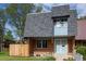 Charming two-story home with brick facade, gray roof, and well-maintained front yard at 11651 Pennsylvania St, Northglenn, CO 80233