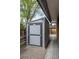 Shed on the side of the house with a cobblestone walkway at 11651 Pennsylvania St, Northglenn, CO 80233