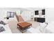 Finished basement with living area, wet bar, and staircase at 516 Grant Ave, Louisville, CO 80027