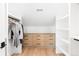 Organized walk-in closet featuring custom built-in shelving, drawers, and clothing rods at 516 Grant Ave, Louisville, CO 80027