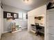 Fun bedroom with lofted bed, study space and colorful accents at 10968 Pastel Pt, Parker, CO 80134