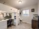Bedroom with lofted bed, study space and plenty of storage at 10968 Pastel Pt, Parker, CO 80134