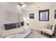 Comfortable bedroom features stylish decor and soft, neutral tones at 2846 Champa St, Denver, CO 80205