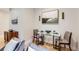 Cozy dining area with seating for two, and hardwood floors at 2846 Champa St, Denver, CO 80205