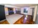 Finished basement featuring a fireplace, recessed lighting, neutral carpeting and textured accent wall at 2548 S Zurich Ct, Denver, CO 80219