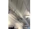 Modern ceiling with track lighting illuminating this home's interior, enhancing its sleek design and feel at 2548 S Zurich Ct, Denver, CO 80219