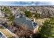 An aerial view of the home showcasing the roof with solar panels at 4212 E Orchard Pl, Centennial, CO 80121