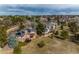 An aerial view showcases the neighborhood and surrounding landscape, showing other houses at 4212 E Orchard Pl, Centennial, CO 80121