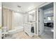 Well-maintained bathroom with tub-shower combo, tile floors, and a white vanity at 4212 E Orchard Pl, Centennial, CO 80121