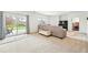 Spacious living room boasts natural light, neutral tones and walkout access to the backyard patio at 4212 E Orchard Pl, Centennial, CO 80121