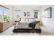 Serene main bedroom with lots of natural light, neutral tones, and ample closet space at 4212 E Orchard Pl, Centennial, CO 80121