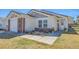 Charming single-story home featuring a brick facade, well-maintained lawn, and inviting front entrance at 200 Vista Blvd, Brighton, CO 80603