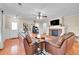 Spacious living room featuring a fireplace, hardwood floors, and comfortable leather furniture at 200 Vista Blvd, Brighton, CO 80603