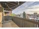 Cozy balcony with string lights and a beautiful city view, creating a relaxing outdoor space at 65 N Clarkson St # 604, Denver, CO 80218