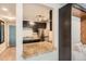 Modern kitchen featuring stainless steel appliances and granite countertop bar at 65 N Clarkson St # 604, Denver, CO 80218