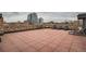 Spacious roof deck offering a relaxing and open-air recreational space with lounge chairs at 65 N Clarkson St # 604, Denver, CO 80218