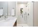 Bright bathroom with a glass enclosed shower and modern fixtures at 4469 Tennyson St # 15, Denver, CO 80212